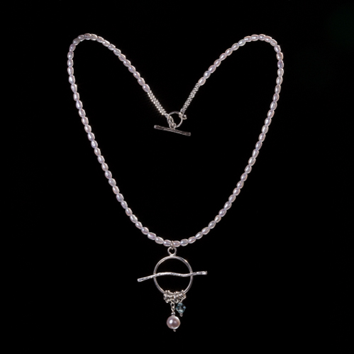 Delicate silver pendant necklace with freshwater pearls